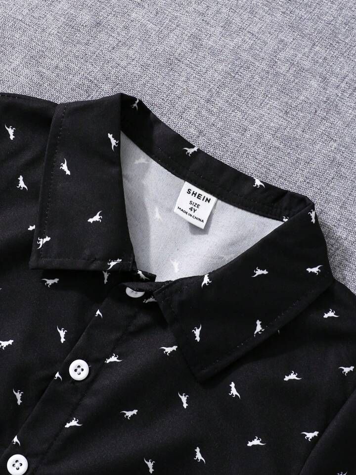 Black Kids' Short-Sleeve Printed Shirt with White Dino Patterns - Stylish & Comfortable