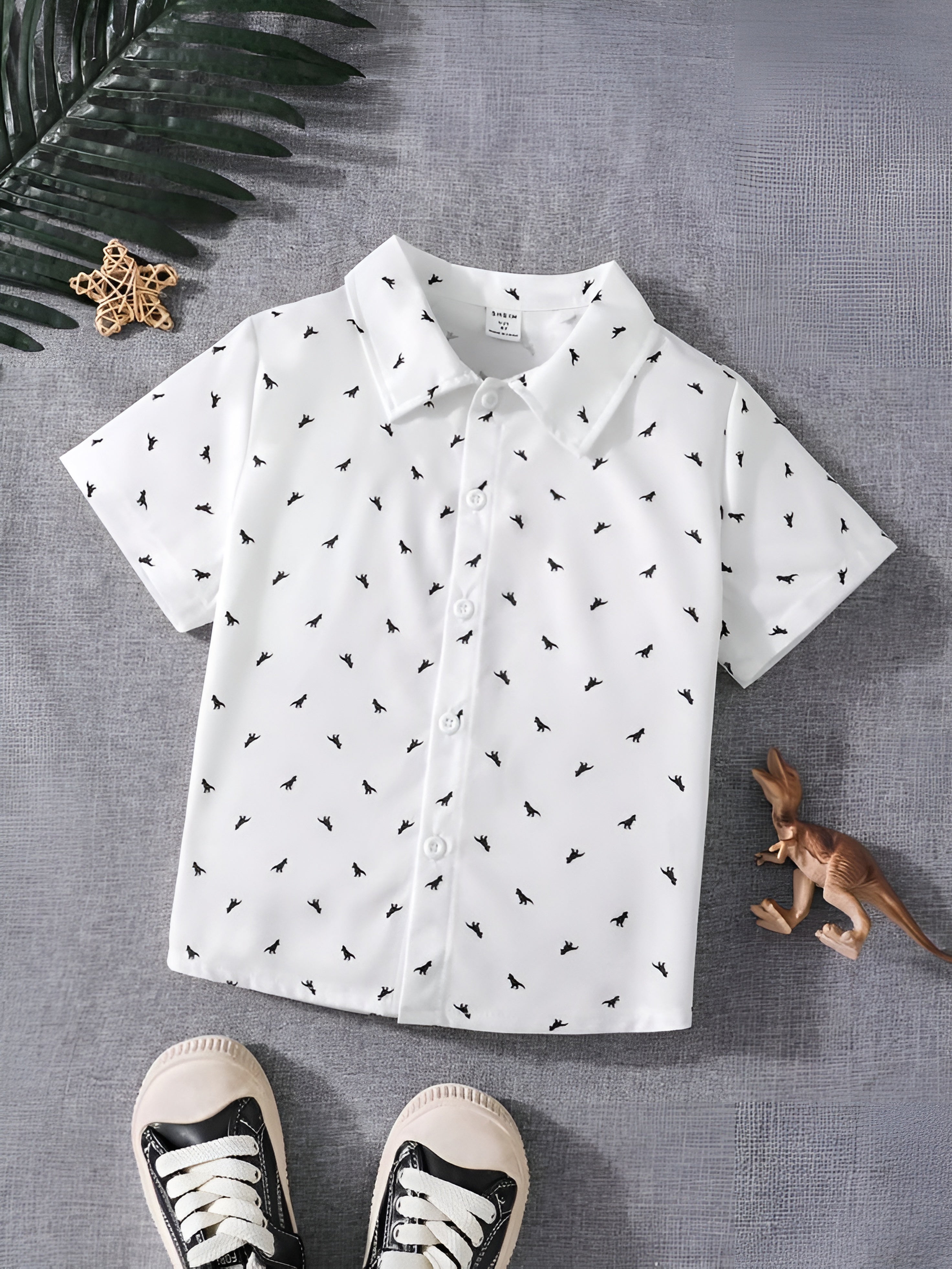 White Kids' Short-Sleeve Printed Shirt with Black Dino Patterns - Stylish & Comfortable